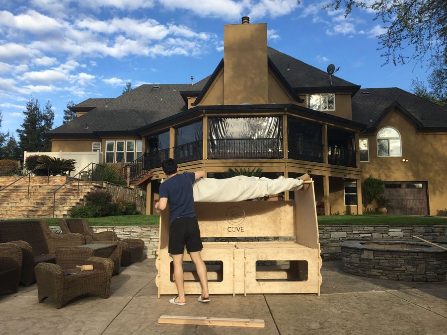 Assembling a flat-pack CNC-cut plywood COVE bed pod outdoors