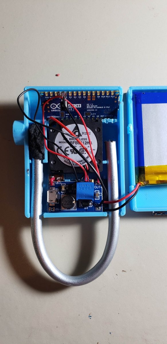Mask electronics: Arduino Nano 33 BLE, brushless blower fan, boost converter, LiPo battery, and aluminum UV chamber tube